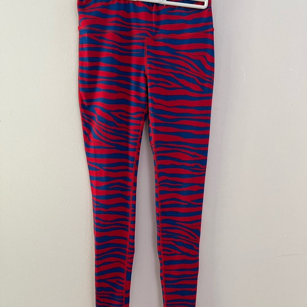 Red and blue zubaz leggings. Vintage Buffalo Bills football game gear.